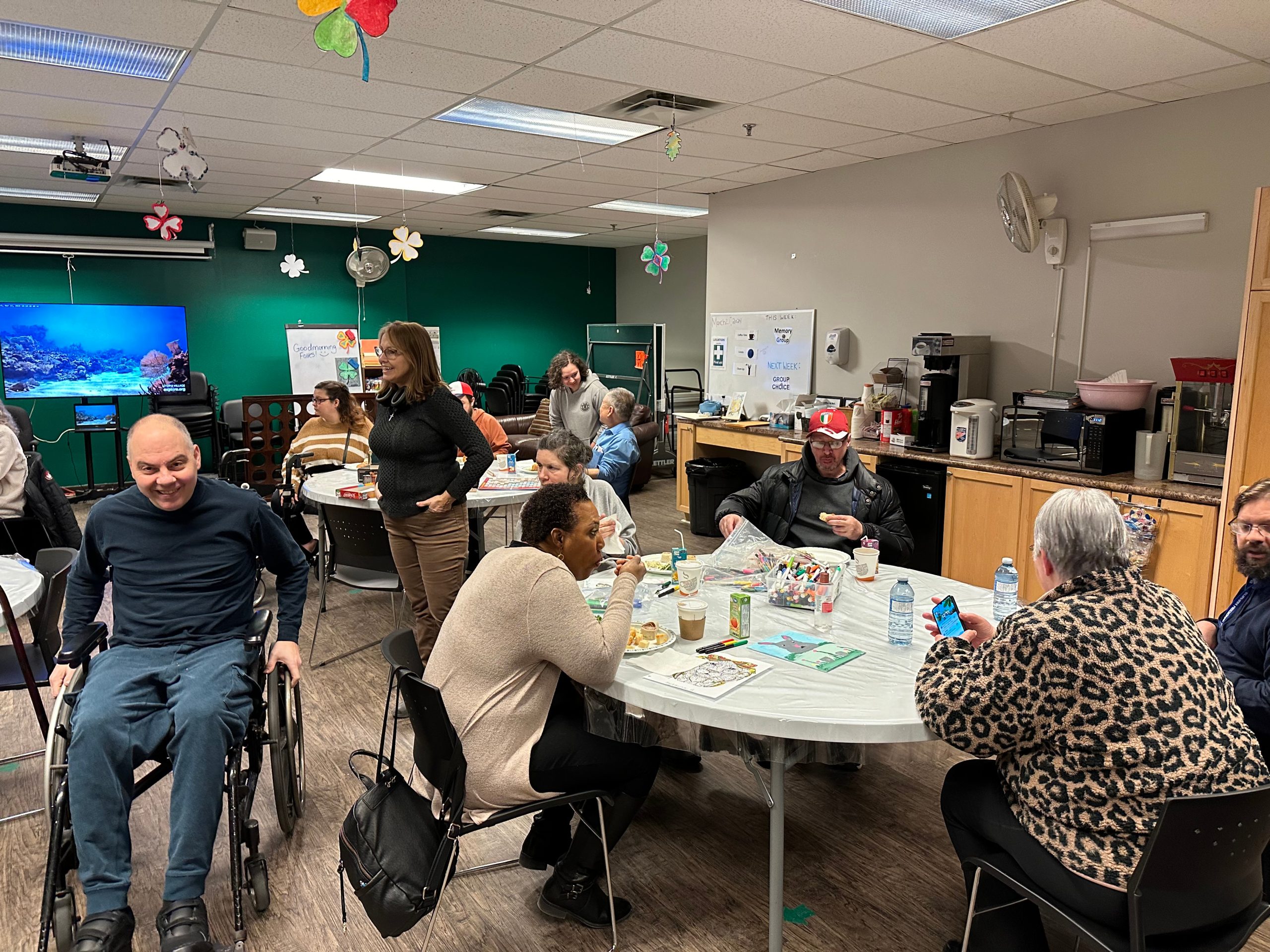 People sitting at tables at a BIAD event
